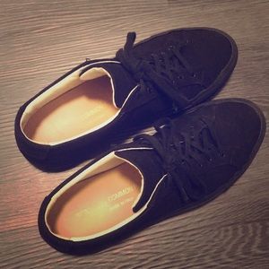 Black canvas common projects women’s sneakers